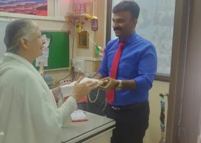 Clinic reception desk interaction with a patient