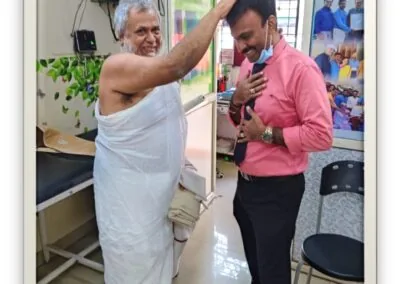 Physiotherapist assessing a patient's shoulder mobility