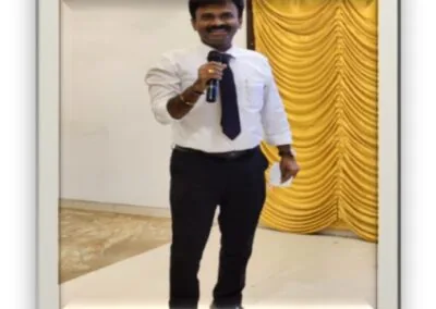 Guest speaker addressing attendees at a physiotherapy workshop